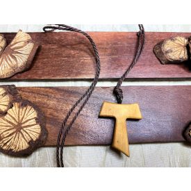 Nyakék Tau olivafa keresztel 