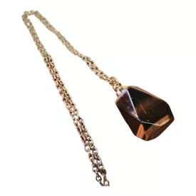 Bevonzó tigrisszem amulett