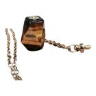 Bevonzó tigrisszem amulett